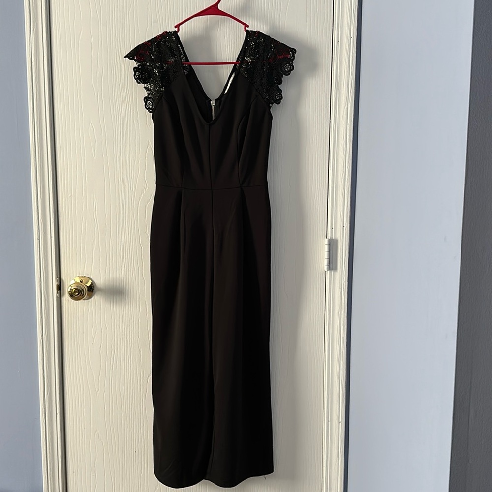Black jumpsuit with lace sleeves